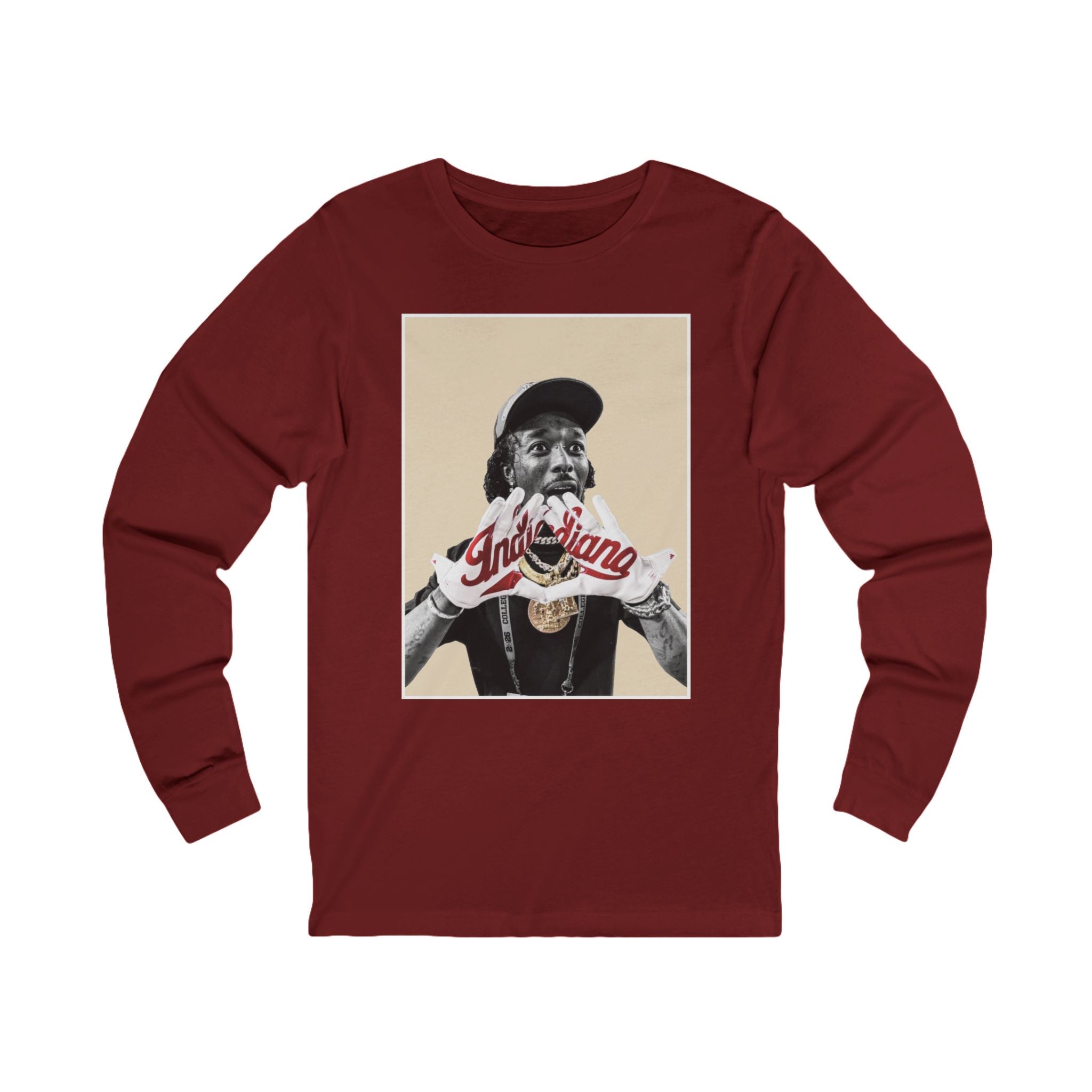 Red long-sleeve shirt with a graphic of a person wearing 'Indiana' gloves on a beige background