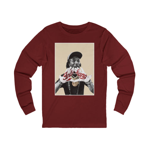 Red long-sleeve shirt with a graphic of a person wearing 'Indiana' gloves on a beige background